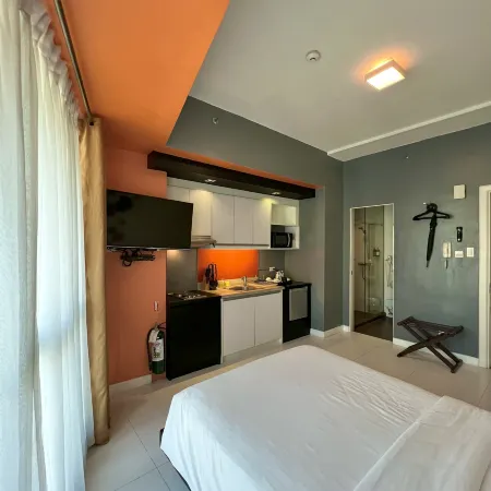 KL Serviced Residences Managed by HII Отели рядом с достопримечательностью «Хард Рок Кафе»