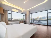 Yijianglou Hotel (Tonglu Fuchunjiang) โรงแรมใกล้ภูเขาโทกุน
