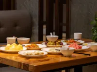 Vienna International Hotel (Guiyang Qingzhen Gaoyuan Mingzhu Junyueguoji) - Aamiainen