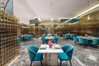 Wyndham Lijiang Yulong Hotel(Lijiang Railway Station) - فطور