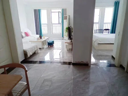 Orange Apartment Отели рядом со станцией Junan Railway Station