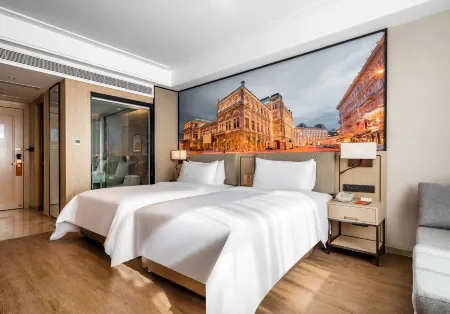 Vienna Hotel (Taiyuan Railway Station Clothing City) Отели рядом с достопримечательностью «Shuangta Temple (Twin Pagoda Temple)»