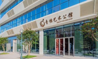 Green Orange Art Hotel Apartment ( Xintang High-speed Railway Station )