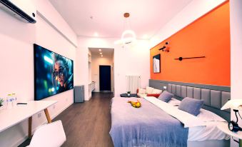 Xinju Sense Apartment (Qingdao Lanshan Bay)