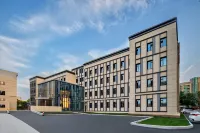 Dongyuan Building Hotel Отели рядом с достопримечательностью «Шаньдунский профессиональный колледж (Западный Кампанский)»