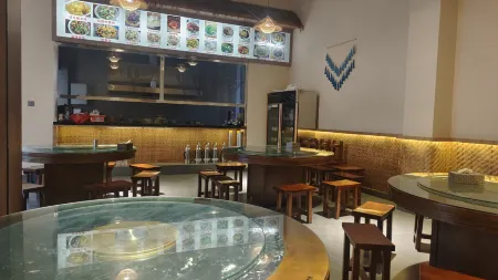 yuanyantitianminsu(duoyishutitianjingqudian) Отели рядом с достопримечательностью «Laohuzui Terraced Field»