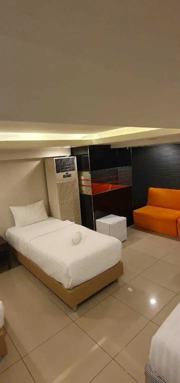 ห้องพักสำหรับสามท่านพร้อมห้องน้ำรวม