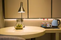 Echarm Hotel (Xishuangbanna Gaozhuang) Hotel a Jinghong