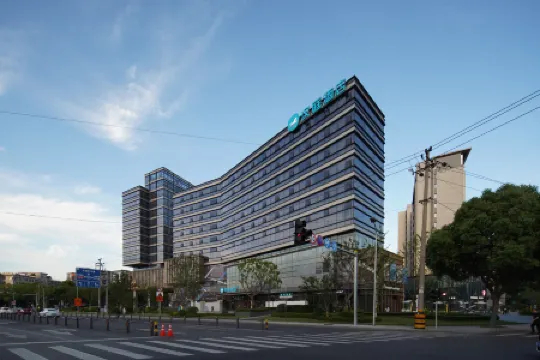 HanTing Hotel (Jiaxing University Nanhu) Отели в г. Цзясин