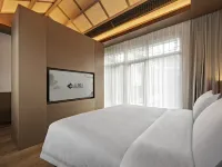Renjoy Hotel Huanggang Jiuzi LuoTian - parking