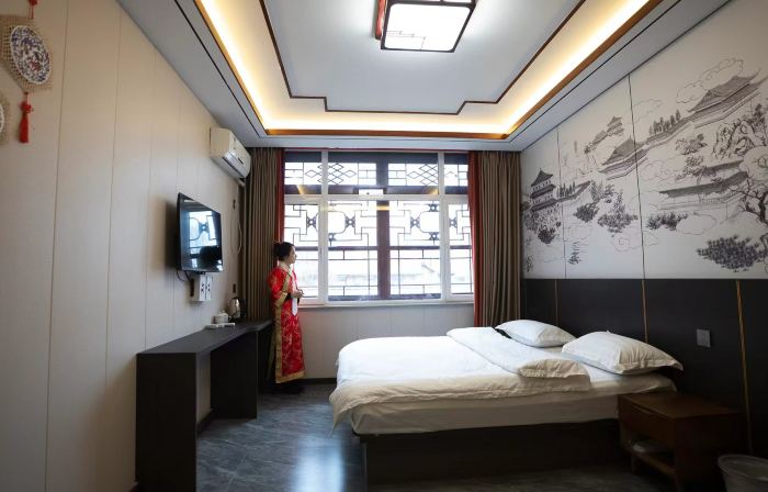 Xinbin Houjin Hotel