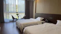 Xinhui Hotel (Meitan Qiushi High School)