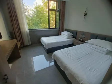 Huiren Mingdu Hotel Отели рядом с достопримечательностью «Minzu Square»