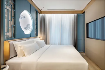 Huali Jiahe Hotel (Beijing Ping'anli Subway Station Branch) Отели рядом с достопримечательностью «Beijing Zhuanta Lane»