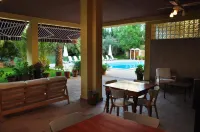 Palm Court Suites