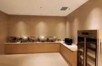 Junyi Hotel - servizio colazione