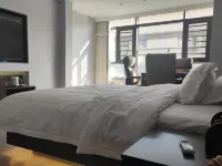 Guangshan Ailaike Homestay (Convention and Exhibition Center) - موقف سيارات
