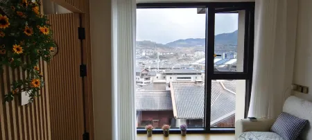 Baili Rhododendron Micro Ke Flower Story B&B Отели рядом с достопримечательностью «Shiniu Tourism Town»