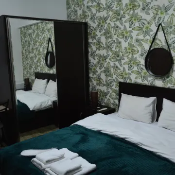 mini hotel nino Отели рядом с достопримечательностью «Jumah Mosque»