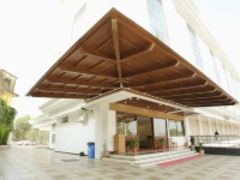 Shambhavi Hotel & Convention Centre Hotels near Adarsh Complex