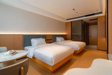 Zhenkang Jindu Hotel Отели рядом с достопримечательностью «Zhenkang Library»