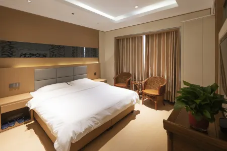 Xinyang Yugang Hotel (Xinyang Railway Station Store) Отели рядом с достопримечательностью «Xinyang Normal University»