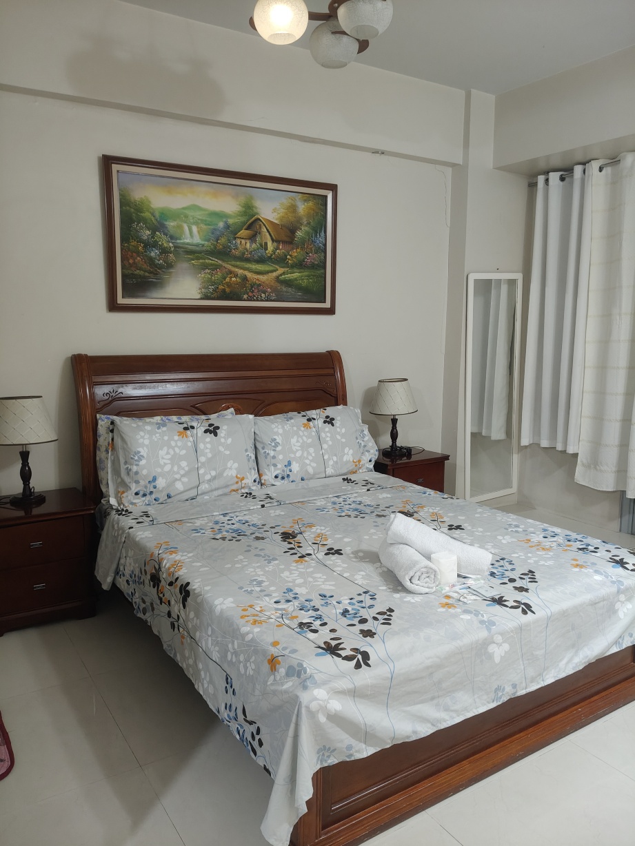 Palm Tree Genlex Condo Hotéis em Pasay