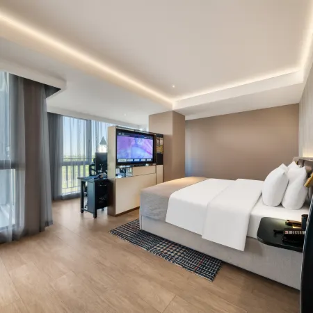Yuyue Esports Hotel (Wuxi Meihua Li Wuyue Water Street Branch) Отели в г. Уси