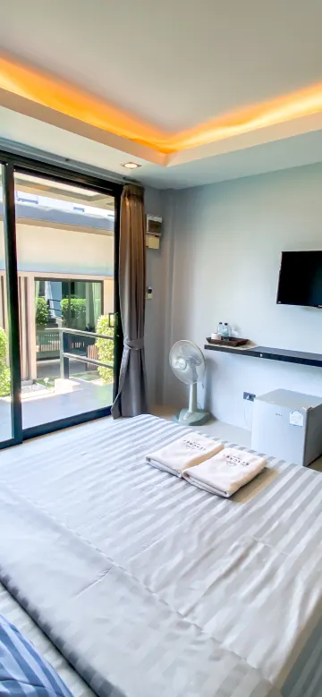 ห้องมาตรฐานชั้นล่างพร้อมระเบียง