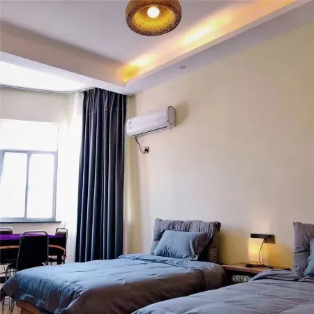 Tengyun Modern Tourism Base B&B (Jinyuan Branch) Отели рядом с достопримечательностью «Taohuayuan Scenic Area»