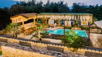 Taohuatan Tage Homestay Hotel dekat Zhangduzhen