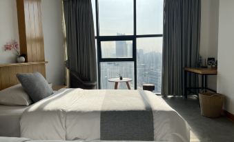 Xiaoyin Qingju Hotel (Guangyuan High-speed Railway Station Jianshe Road)