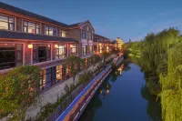 โรงแรมแกรนด์เมซง นิว เซ็นทูรี่ เมืองโบราณไท่เอ่อซวง - ที่มีที่จอดรถ