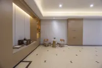 HuaJiYaShe Hotel (Huzhou Zhili Children's Clothing City) - parkir