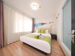 Xinlong Holiday Apartment Hotel