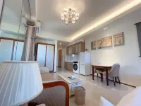 Roland Elegant Residence Homestay (Hohhot East Railway Station Guoneng Building) - Mountain View
