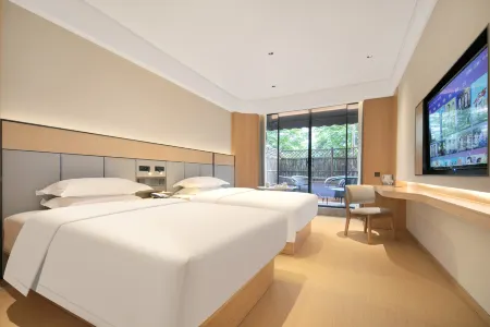 Qingxin Hotel Отели рядом с достопримечательностью «Hubei Enshi College»