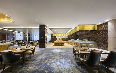 Zhengzhou East Railway Station E-unit  International Hotel Отели рядом с достопримечательностью «Zhengzhou Daxiang Taoci Museum»