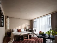 qianhuanflowershejishiyeshedujiajiudian