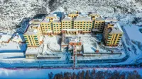 Shenglong Apartment (Wanlong Ski Resort) โรงแรมใน