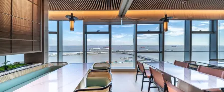 CM+ Serviced Apartment International Cruise  Terminal Shanghai Отели рядом с достопримечательностью «Shanghai Second Polytechnic University Baoshan Campus»