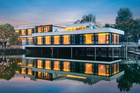 Fenglan Yunju Отели рядом с достопримечательностью «Xi'an Mingde Institute of Technology»