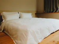 Shijian Homestay (Huoju 8th Street International Coastal Baths) Hotels near Torch 8th Street