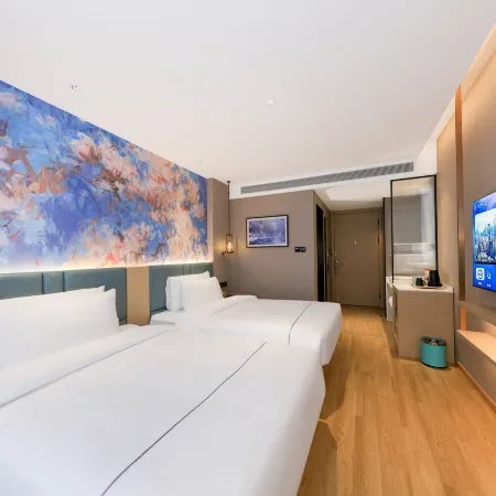 Magnolia Business Hotel (Changbai Mountain West Station Songjiang River Branch) Hoteles en Condado de Fusong