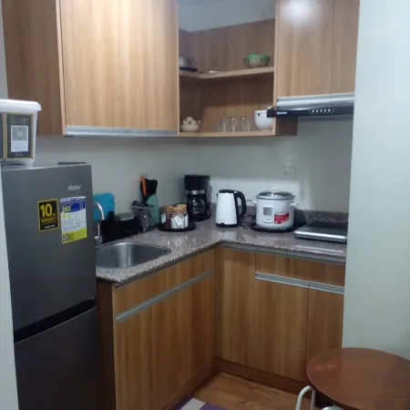 Furnished one bedroom condo near airport