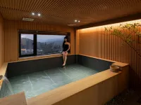 Den Basta Ryokan Mandeok Hoteles cerca de Templo Seokbulsa