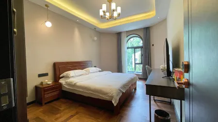 Jeminay Hotel Отели рядом с достопримечательностью «Правительство графства Цзимулу»