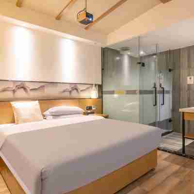 Youjia Traders Hotel (Pengzhou Longxing Temple) Rooms