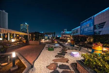 Flora Hotel (Kunming Chenggong Dounan Flower Market) Отели рядом с достопримечательностью «Luolong Park»