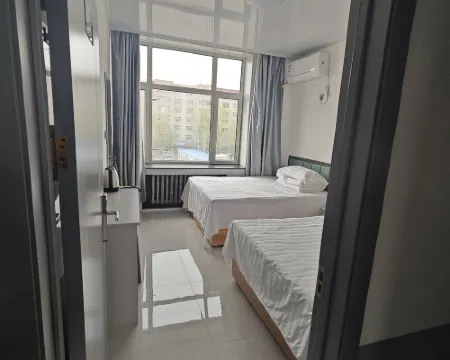 Muling Xinyueguang Inn Hotels in Muling